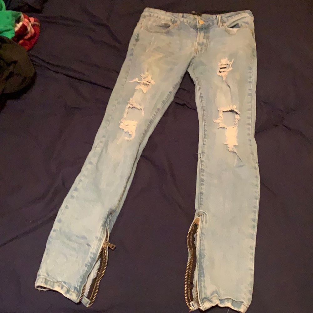 Forver 21 skinny ripped jeans with leg zipper.
